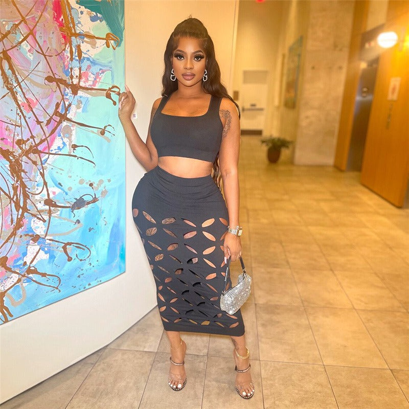 Summer European and American women's hollowed out sleeveless top slim fit sexy long skirt set