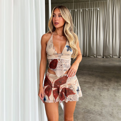 Sexy mesh printed neck hanging vest with exposed navel short skirt two-piece set