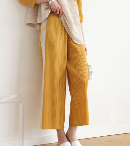 Fashionable Loose Irregular T-Shirt and Nine-Quarter Pants Set with Pleated Design, Comfortable and Slimming for Summer