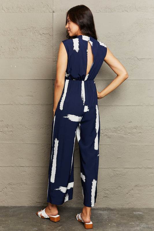 Perfee Printed Round Neck Cutout Jumpsuit with Pockets - product photo 2