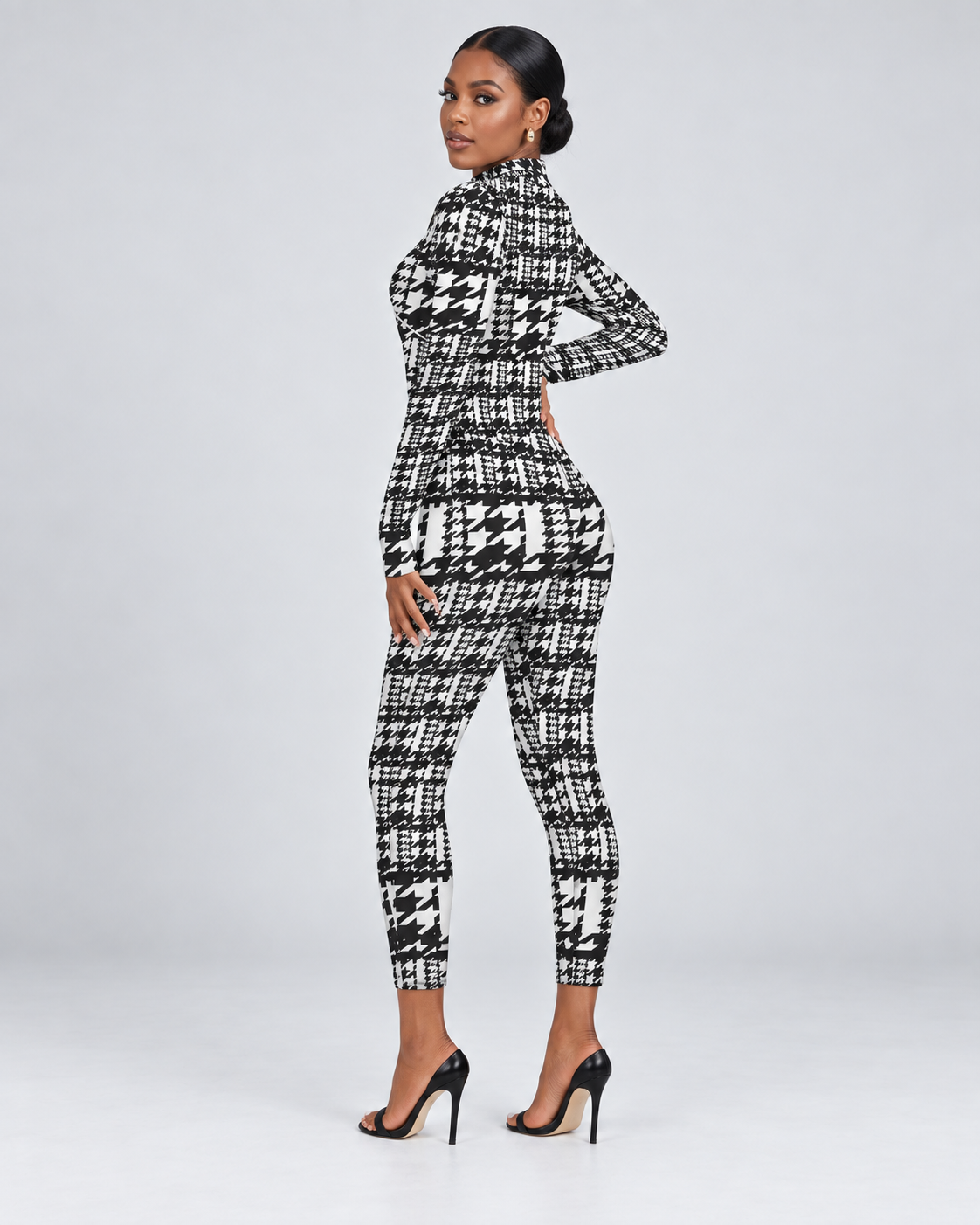 The Houndstooth Remix Jumpsuit — Rear view on a Black model